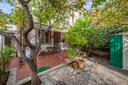 Villino a schiera con giardino in zona EUR, in vendita, Roma | Sotheby’s Realty Italy - 1