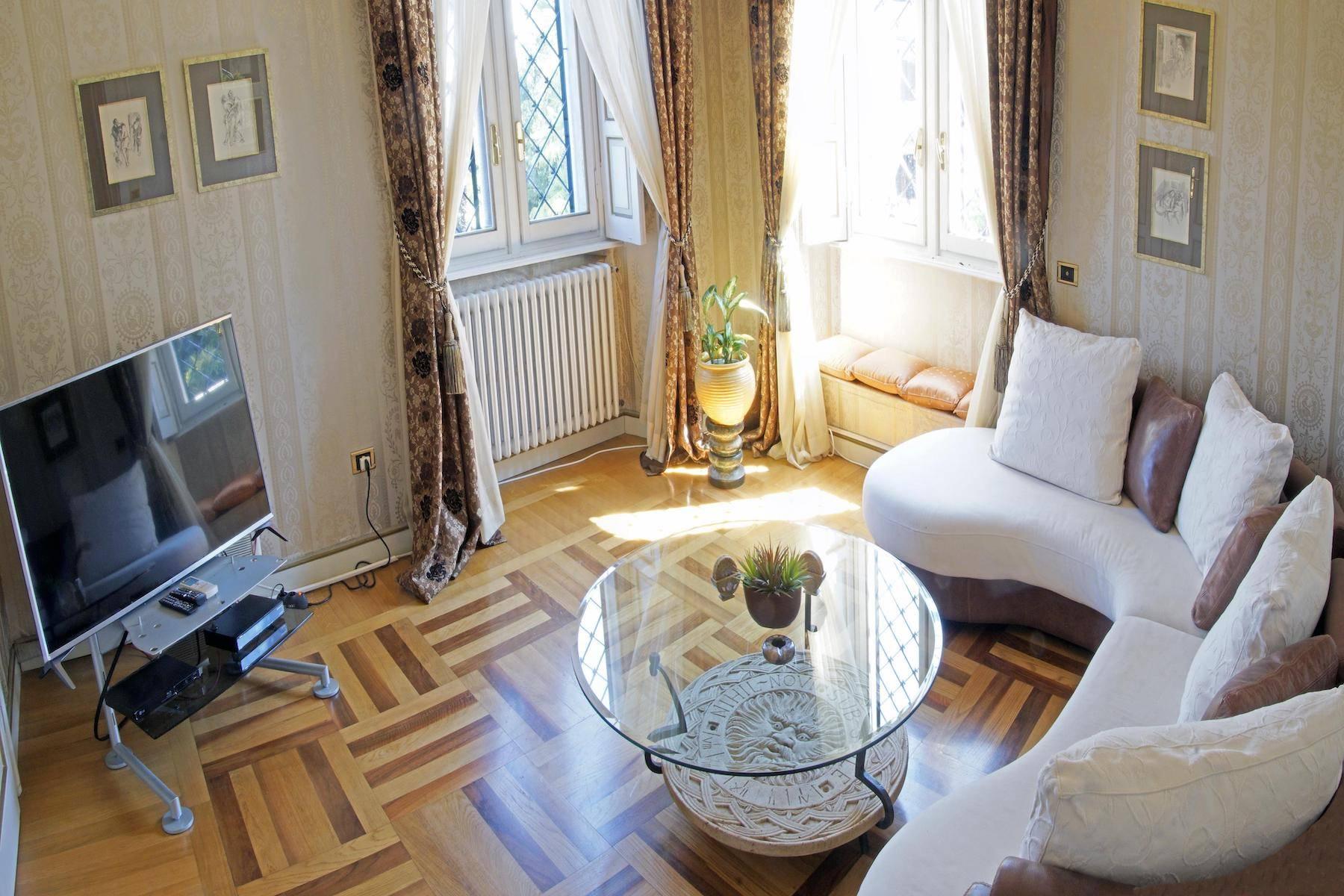Majestic period villa with swimming pool and tower in the heart of Stresa - 21