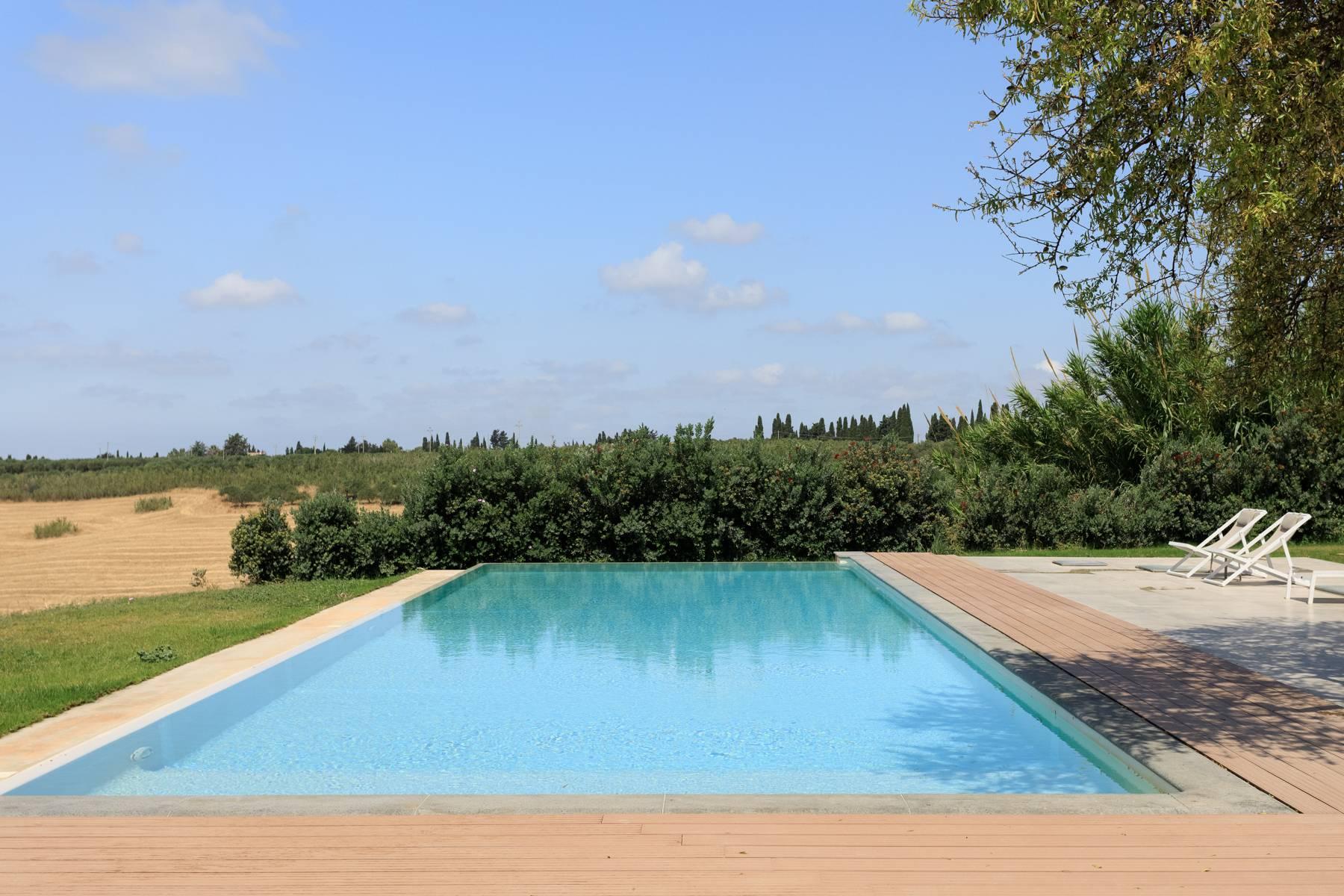 Baglio umgeben von Olivenbäumen mit Meerblick in Menfi - 11