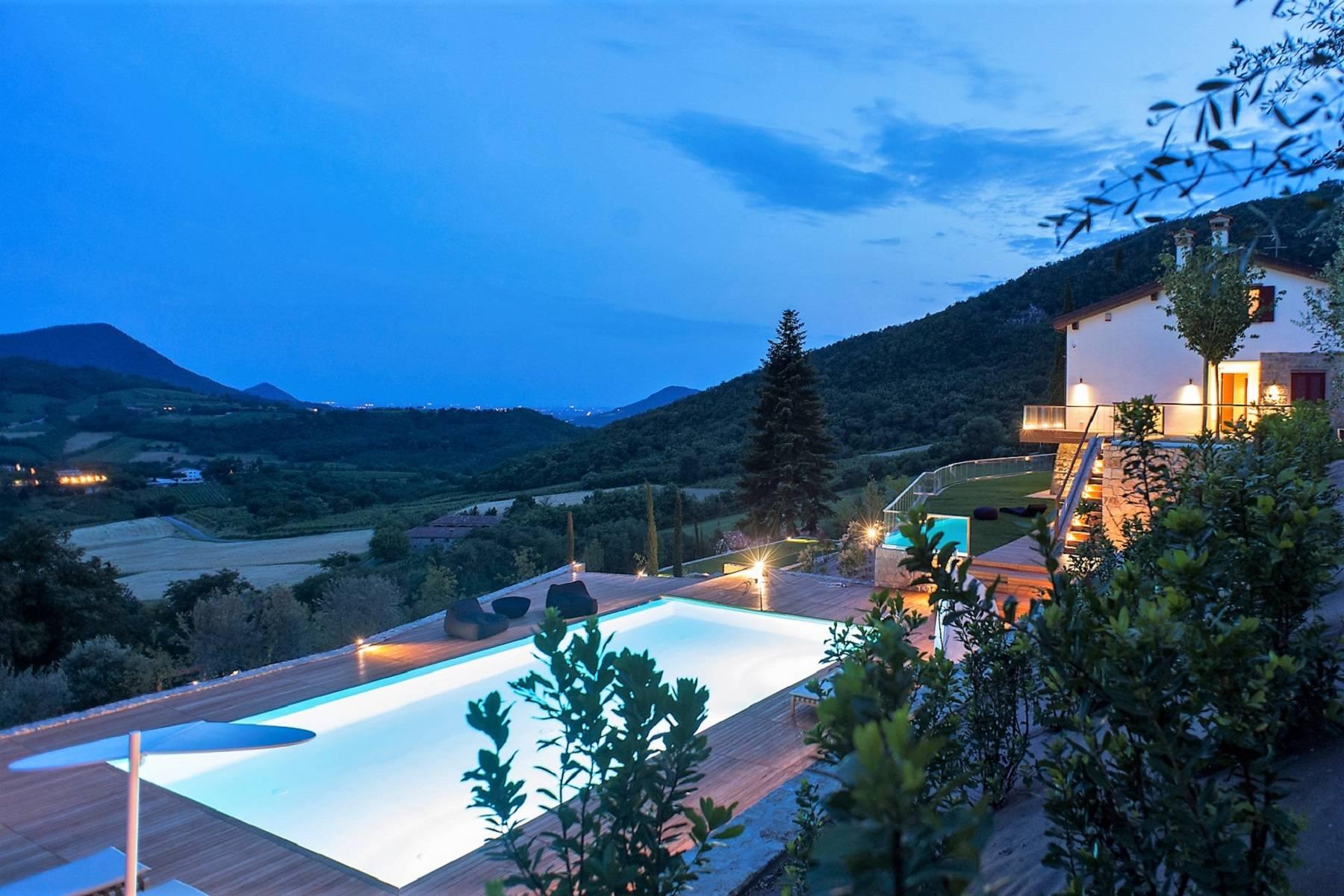Modern hilltop villa with swimming pool, heliport, horse stable and lodge - 1