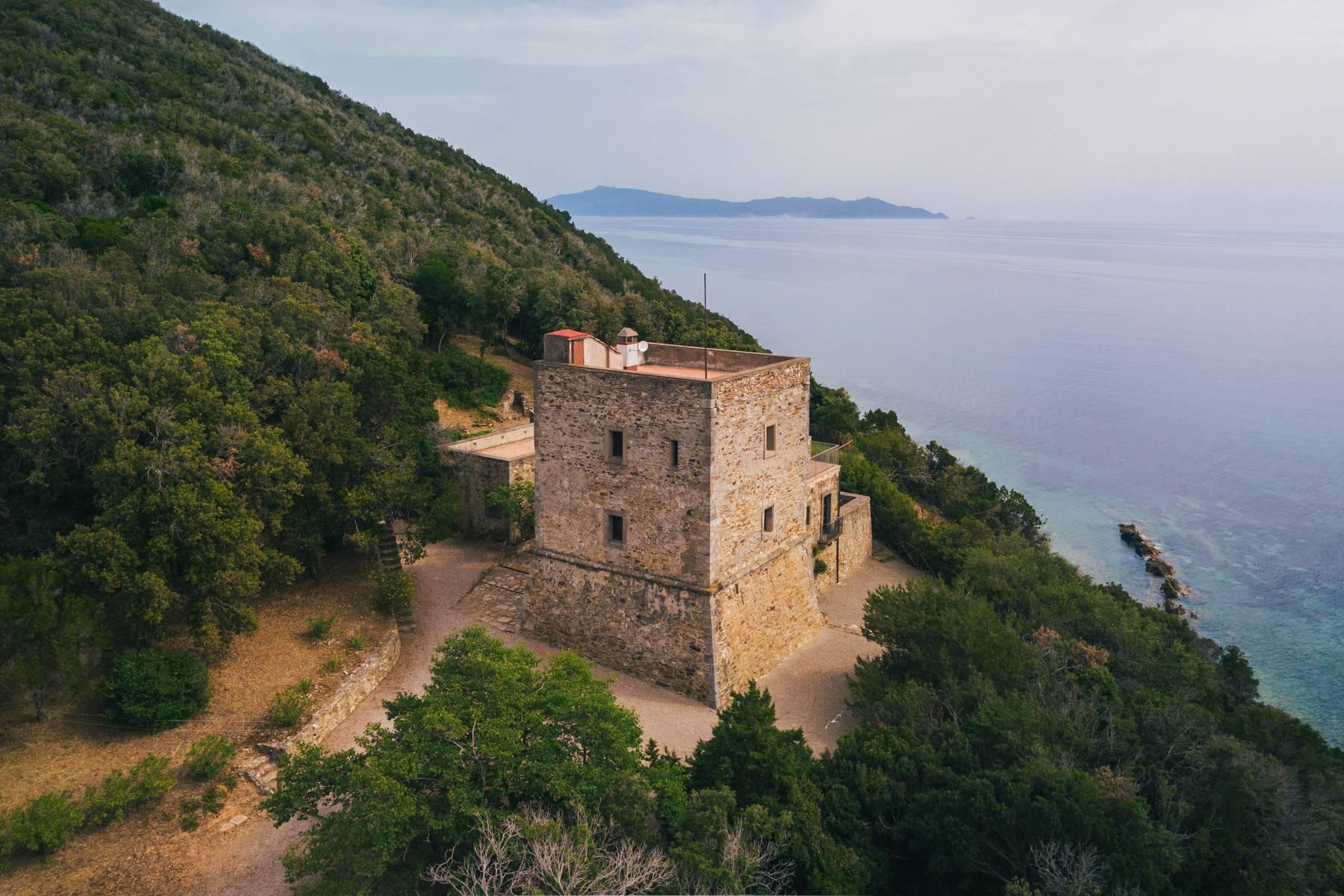 Ancient watchtower of the 15th century on a cliff directly overlooking the sea - 21