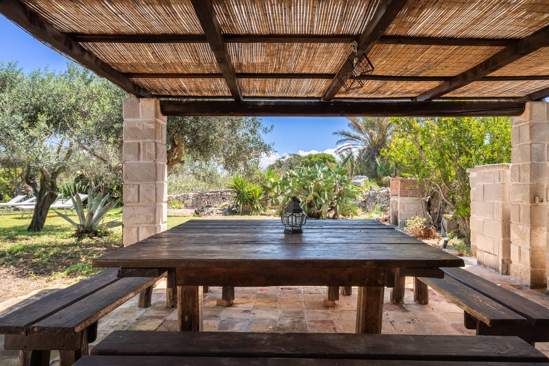 Splendid property on the island of Favignana consisting of two houses and an annex immersed in a typical garden with Mediterranean scrub and fruit trees and a stone's throw from Cala San Nicola - 42