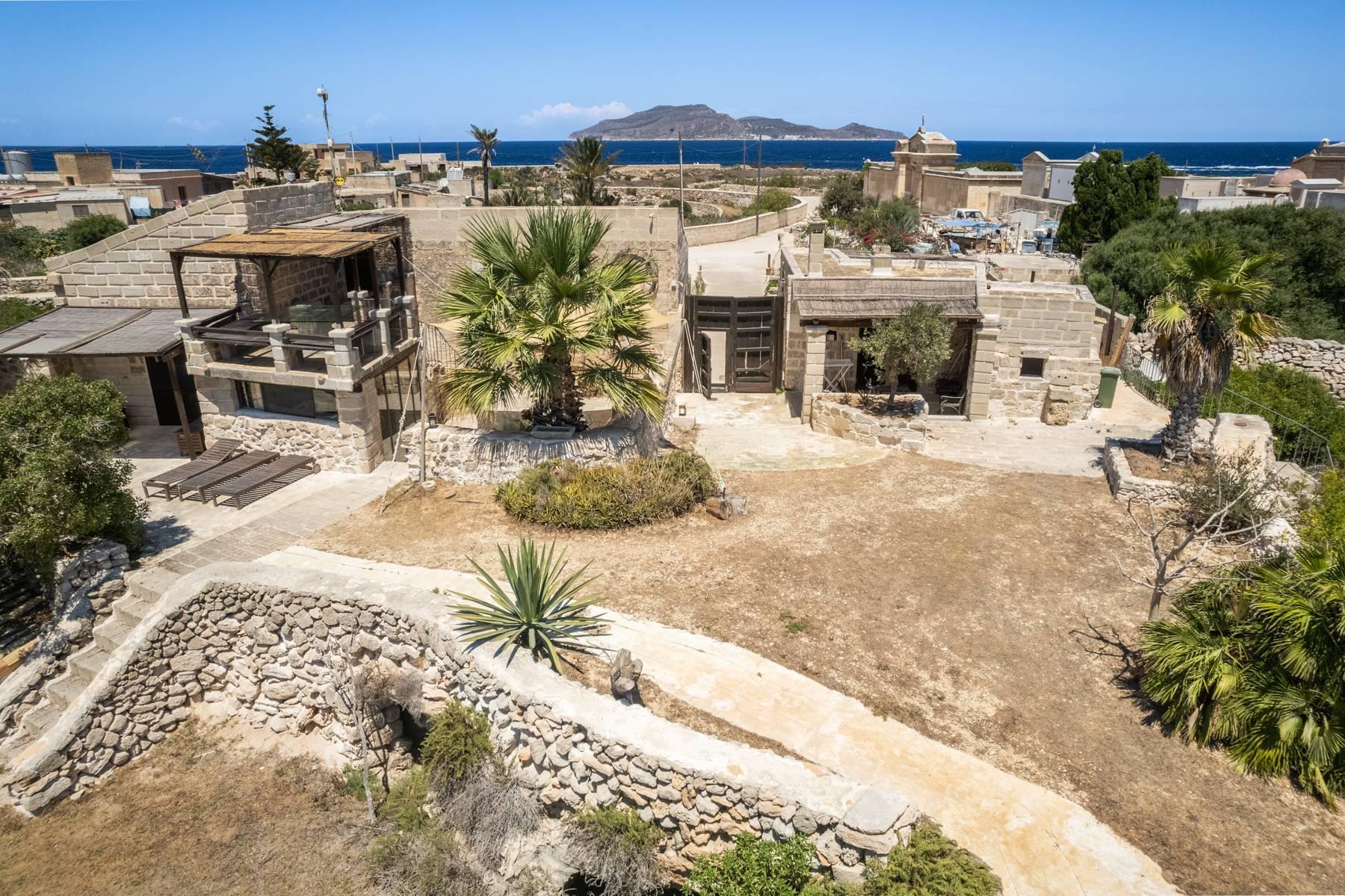 Splendid property on the island of Favignana consisting of two houses and an annex immersed in a typical garden with Mediterranean scrub and fruit trees and a stone's throw from Cala San Nicola - 50