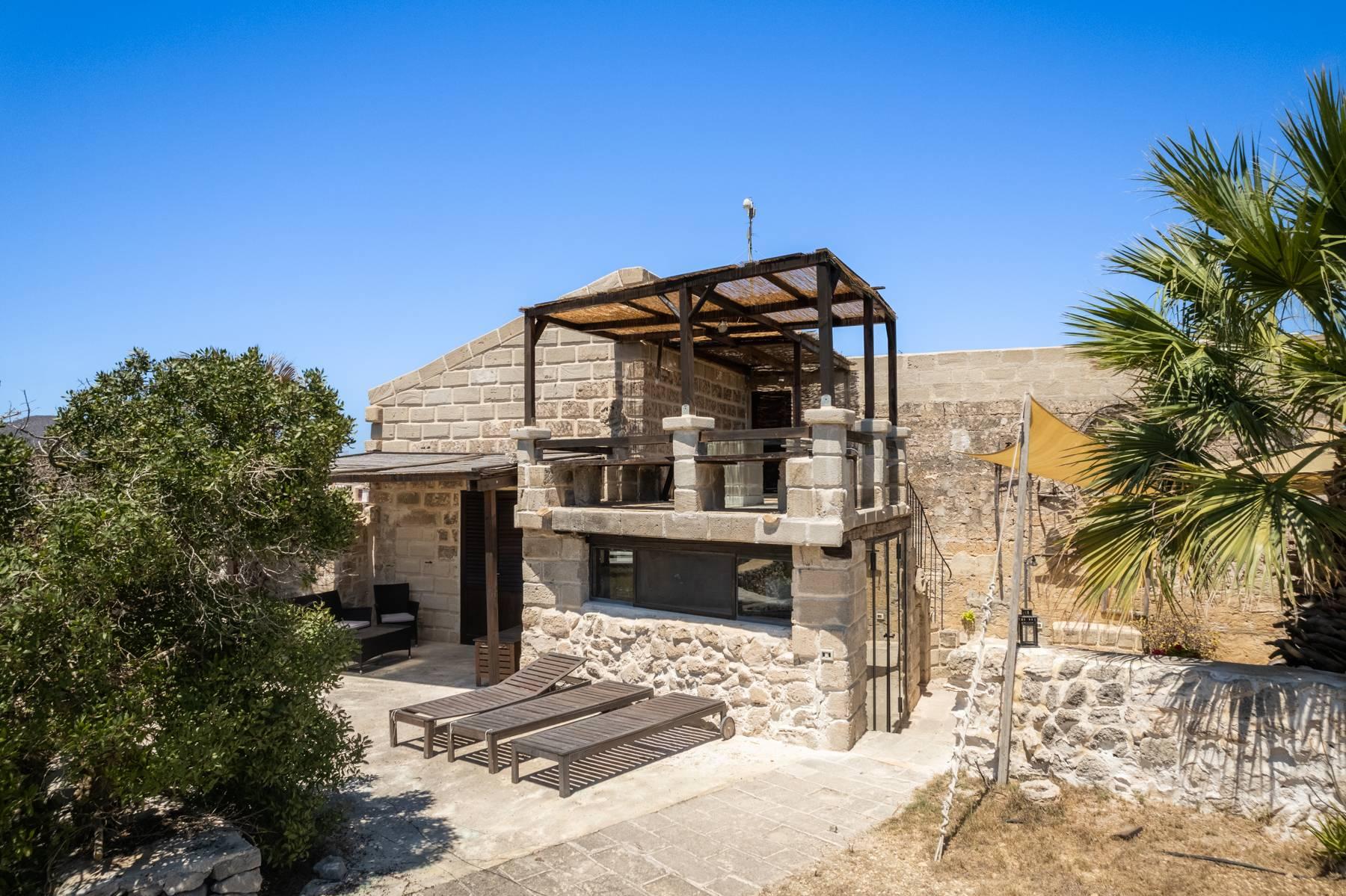 Splendid property on the island of Favignana consisting of two houses and an annex immersed in a typical garden with Mediterranean scrub and fruit trees and a stone's throw from Cala San Nicola - 53