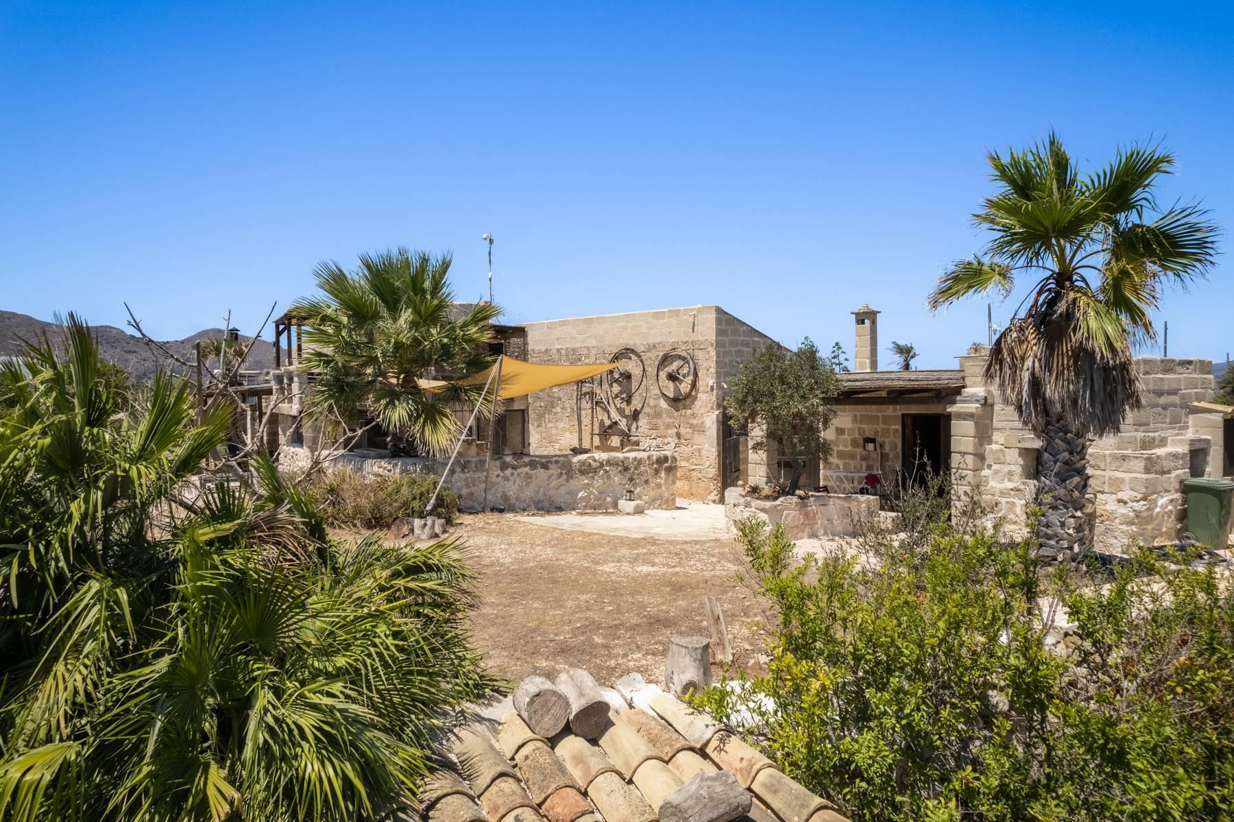 Splendid property on the island of Favignana consisting of two houses and an annex immersed in a typical garden with Mediterranean scrub and fruit trees and a stone's throw from Cala San Nicola - 54