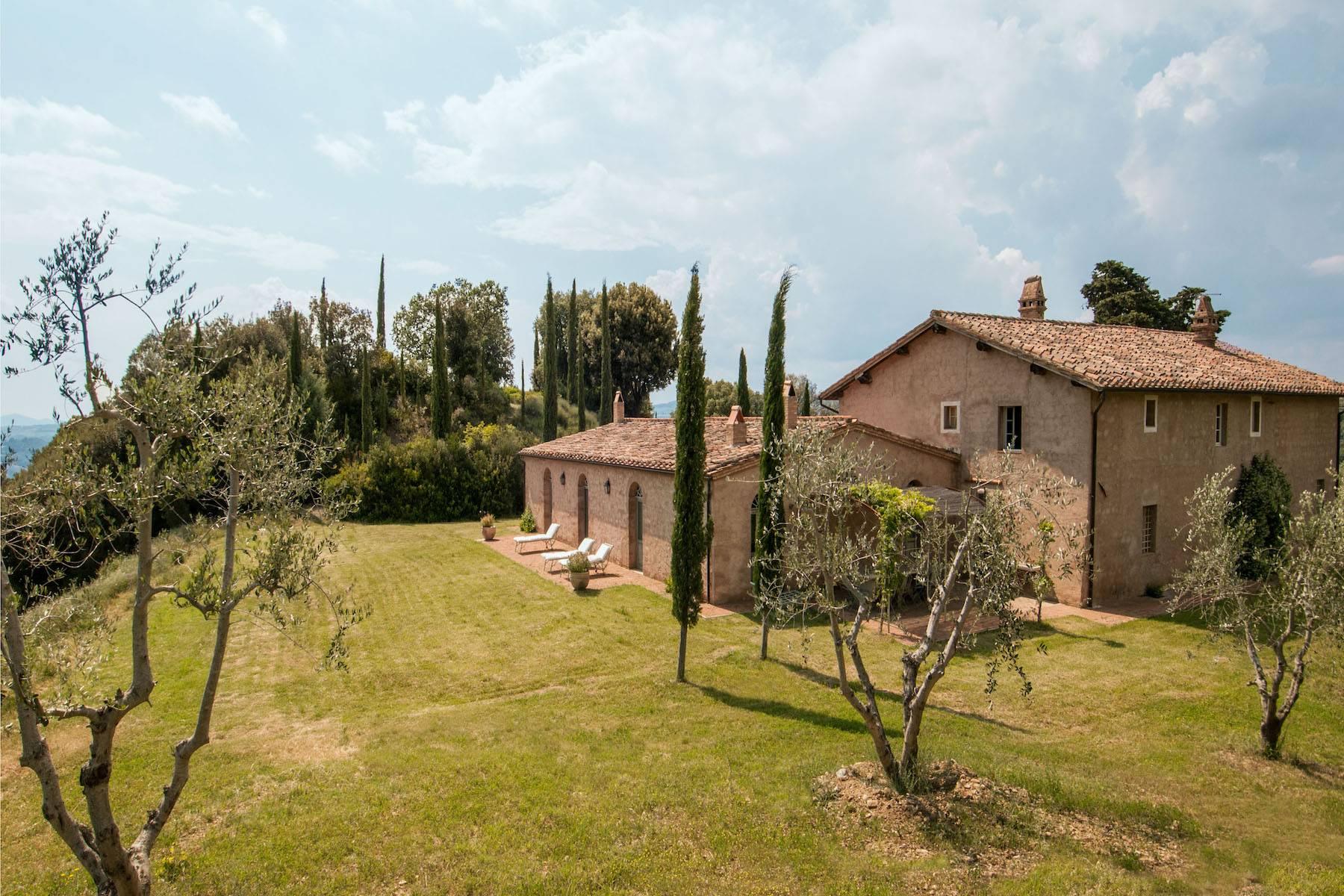 Villa prestigieuse dans les collines douces près de Montalcino - 1