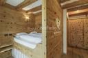 Chalet moderno immerso nelle Dolomiti trentine, in vendita, Pinzolo | Sotheby’s Realty Italy - 14