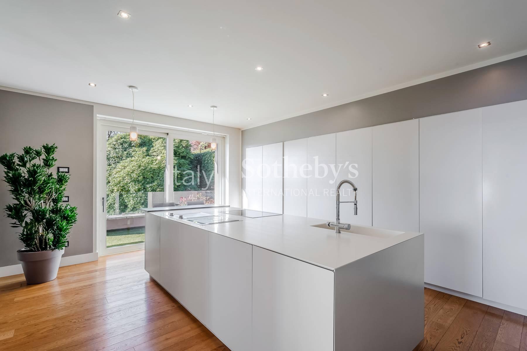 Exclusive modern villa with panoramic lake views and spa - 7