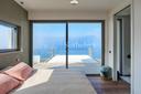 Splendida villa con vista sul Lago di Garda e piscina a sfioro, in vendita, Torri del Benaco | Sotheby’s Realty Italy - 11