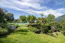 Villa panoramica con grande giardino e piscina, in vendita, Cene | Sotheby’s Realty Italy - 5