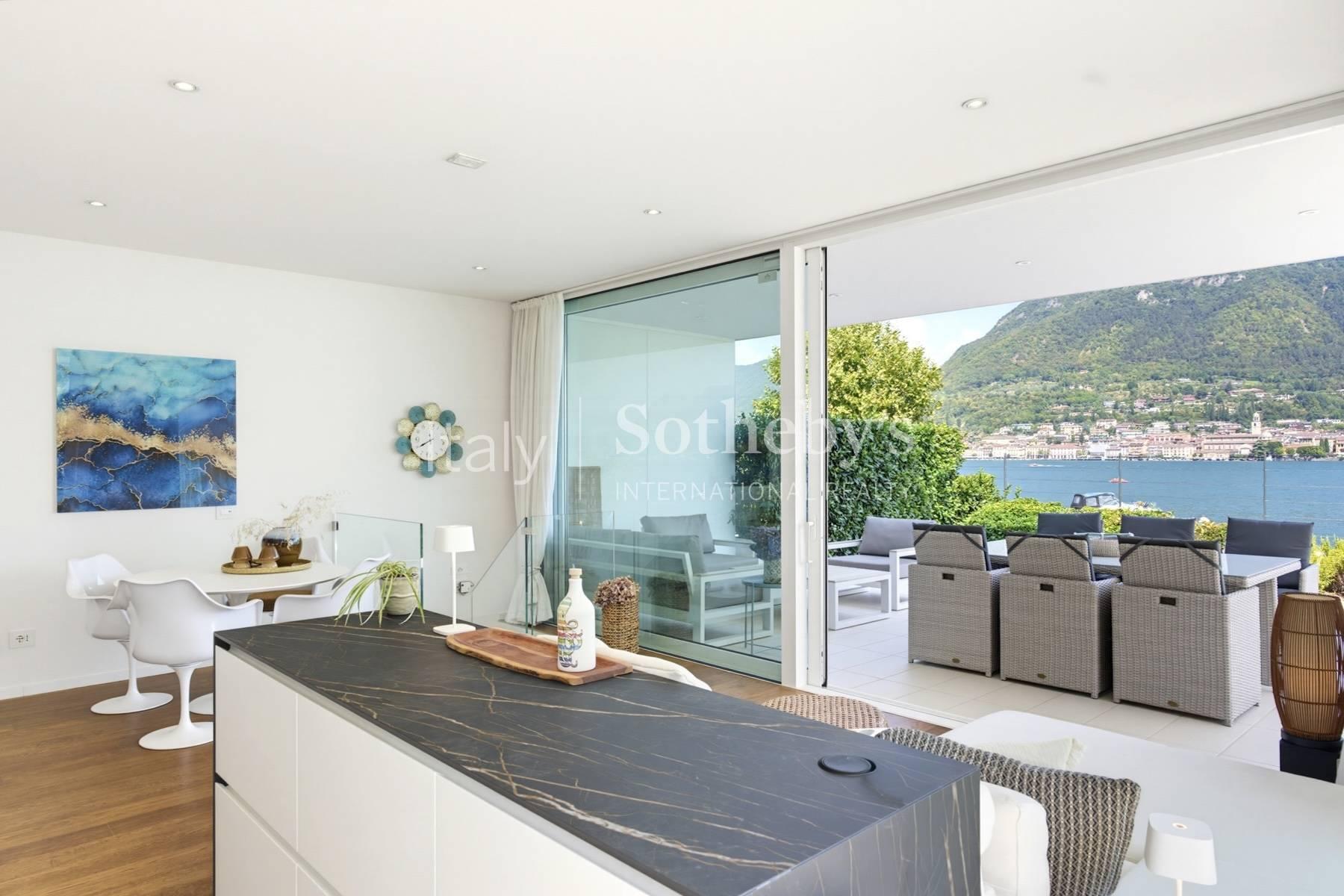 Appartamento fronte lago con giardino privato - 6
