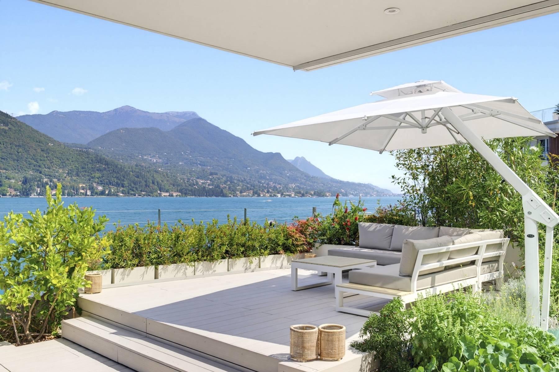 Appartamento fronte lago con giardino privato - 1