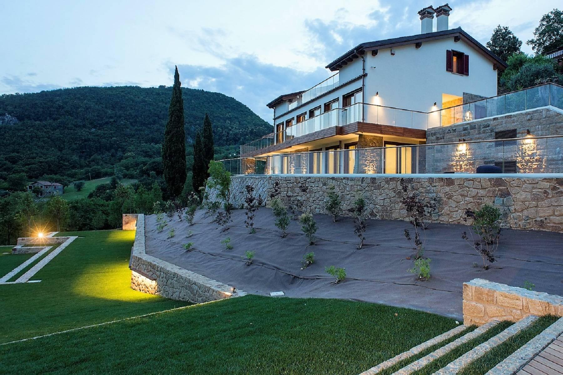 Modern hilltop villa with swimming pool, heliport, horse stable and lodge - 2