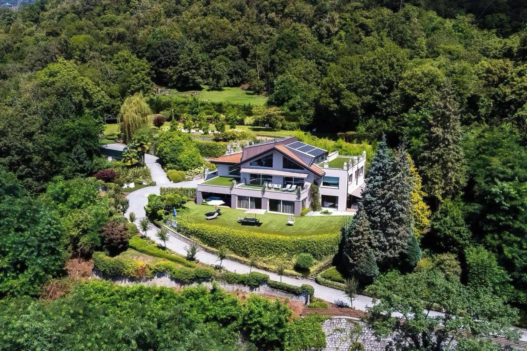 Exclusive modern villa with panoramic lake views and spa - 1